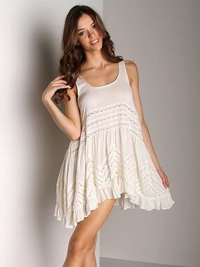 Women's Ivory Sleeveless Ruffle-Hem Tunic Top